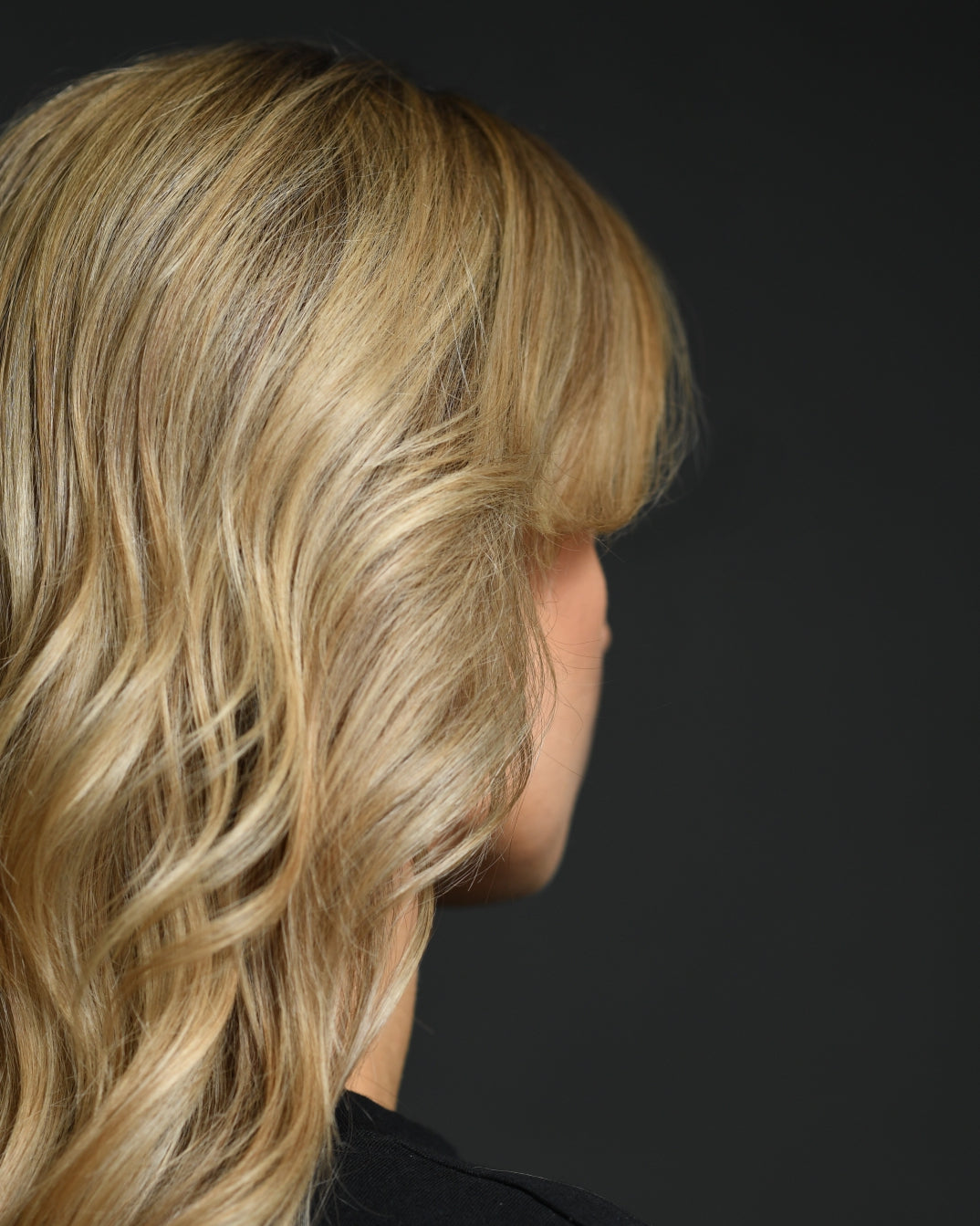 Natural blonde balayage with textured layers, side profile. Colour by Aneta Dina Petsa at HAIR ETC. STUDIO Nicosia Cyprus